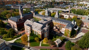 A colorful aerial view of the Holy Cross campus during autumn.